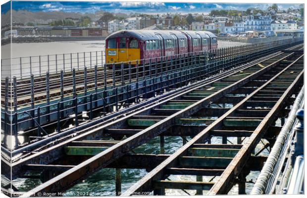 Train on Ryde Pier Isle of Wight Canvas Print by Roger Mechan