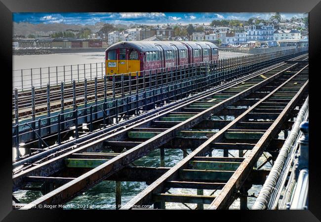 Train on Ryde Pier Isle of Wight Framed Print by Roger Mechan