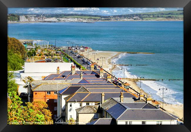 Sandown beach and houses Isle of Wight Framed Print by Roger Mechan