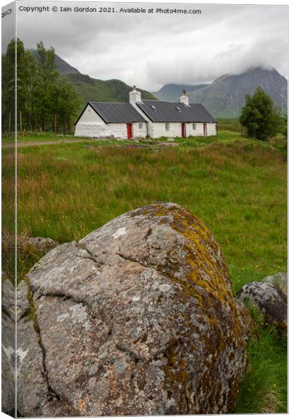 The Black Rock Cottage & Buachaille Etive Mor Glencoe Scotland Canvas Print by Iain Gordon