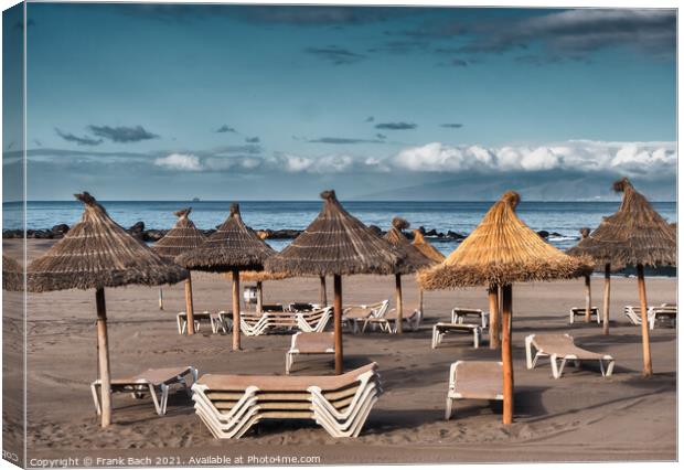 Beach with sunshades Playa Los Americas on Tenerife, Spain Canvas Print by Frank Bach