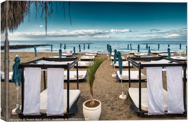 Sunbeds on the beach in Playa Los Americas on Tenerife, Spain Canvas Print by Frank Bach