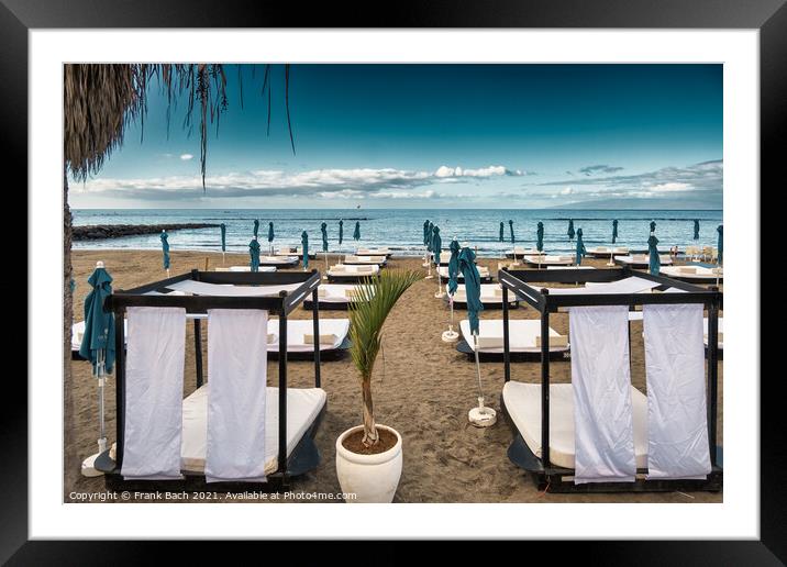Sunbeds on the beach in Playa Los Americas on Tenerife, Spain Framed Mounted Print by Frank Bach