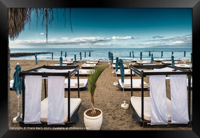 Sunbeds on the beach in Playa Los Americas on Tenerife, Spain Framed Print by Frank Bach