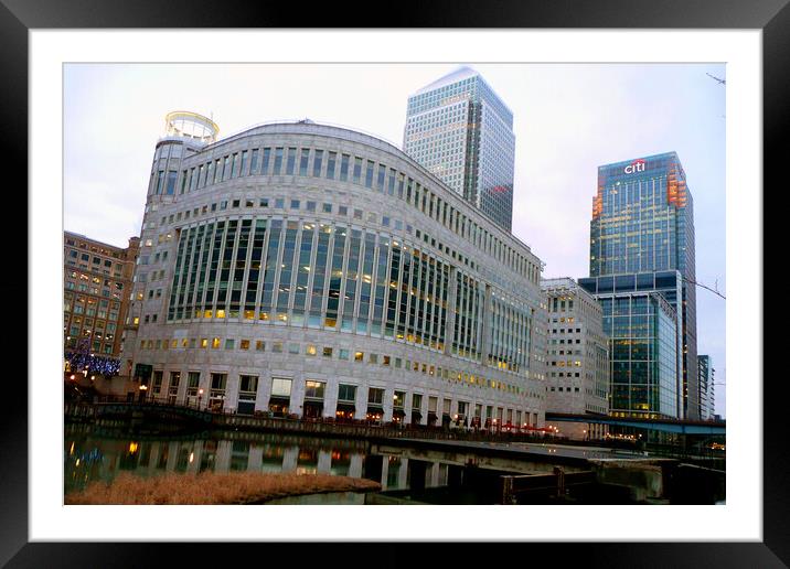 Majestic Canary Wharf rises above London's Docklan Framed Mounted Print by Andy Evans Photos