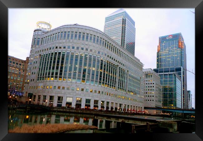 Majestic Canary Wharf rises above London's Docklan Framed Print by Andy Evans Photos