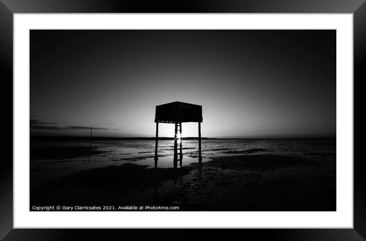 A Moody Refuge Box at Holy Island Framed Mounted Print by Gary Clarricoates