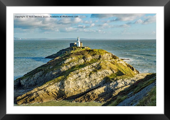Mumbles Lighthouse on a rock in Gower south Wales Framed Mounted Print by Nick Jenkins
