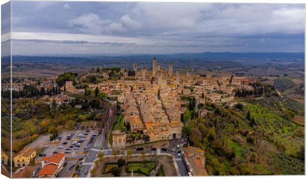 Village of San Gigmignano in Tuscany Italy - aerial view Canvas Print by Erik Lattwein