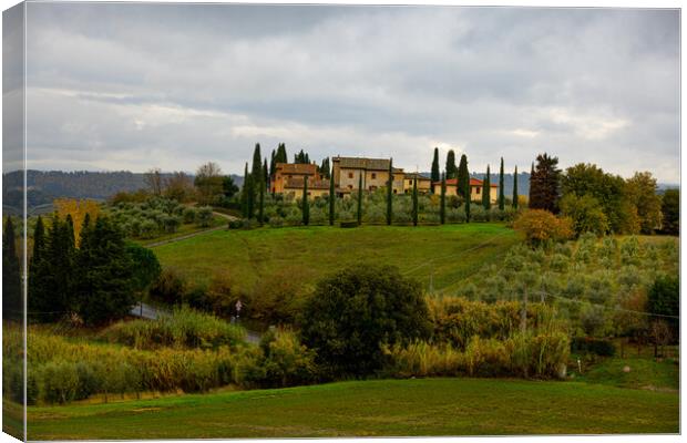 Typical country houses and cypresses in Tuscany Canvas Print by Erik Lattwein