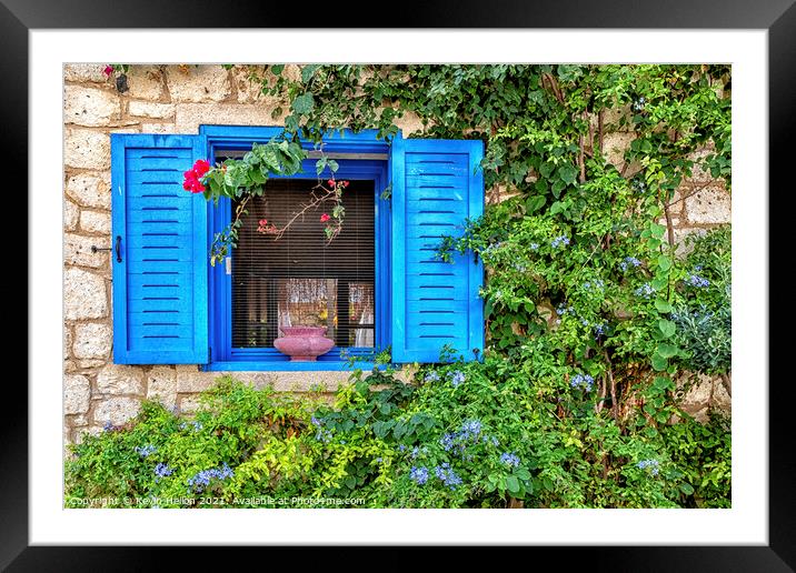 Blue window with shutters and flowers, Alacati, Framed Mounted Print by Kevin Hellon