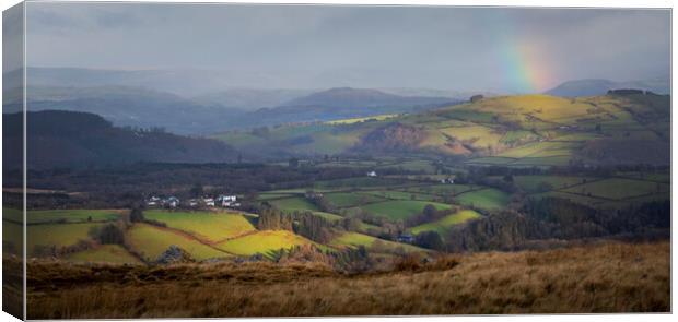 Welsh hills and a rainbow Canvas Print by Leighton Collins