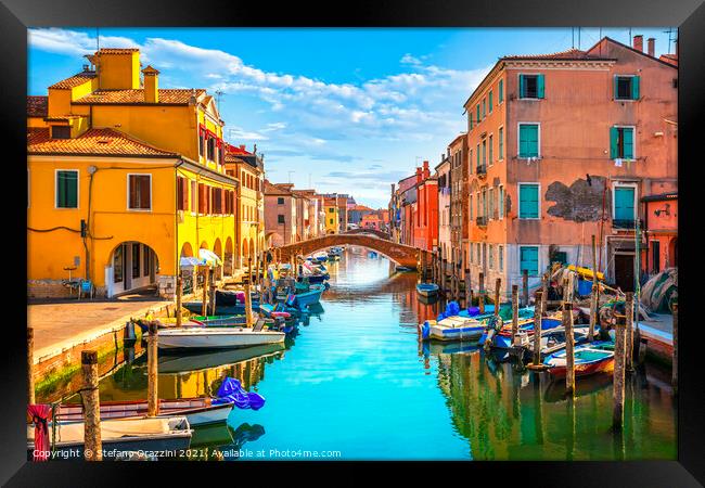 Chioggia town in venetian lagoon, water canal and boats. Framed Print by Stefano Orazzini