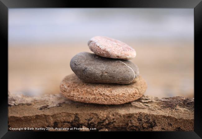 Pebble stack on drift wood Framed Print by Beth Hartley