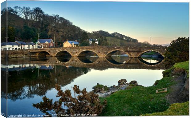 Sunset reflection, Dyfi Bridge, Machynlleth, Wales Canvas Print by Gordon Maclaren