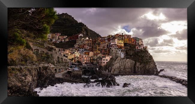 The colorful houses of Manarola in Cinque Terre  Framed Print by Erik Lattwein