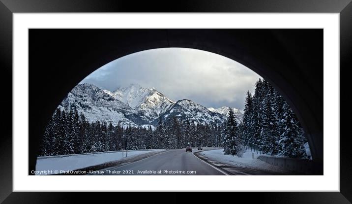 A view of snow covered mountains and roads through an arch. Framed Mounted Print by PhotOvation-Akshay Thaker
