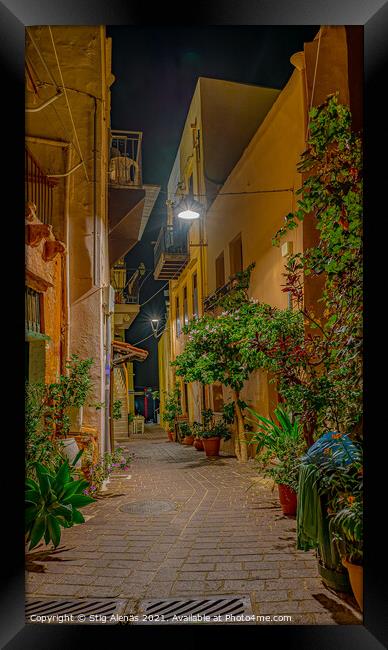 picturesque alley at night in the old town of Chania, Crete Framed Print by Stig Alenäs