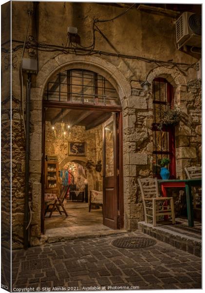 Entrance to a boutique at the romanticue stairs on the Zampeliou Canvas Print by Stig Alenäs