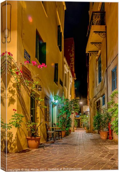 a narrow alley at night in the old town of Chania Canvas Print by Stig Alenäs