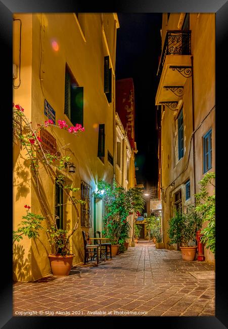 a narrow alley at night in the old town of Chania Framed Print by Stig Alenäs