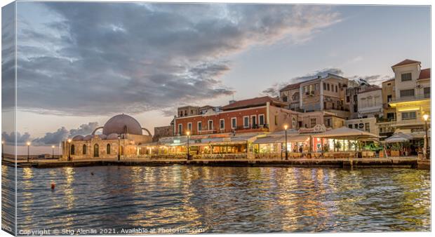 the mosque and restaurants in the venetian harbour of Chania in  Canvas Print by Stig Alenäs