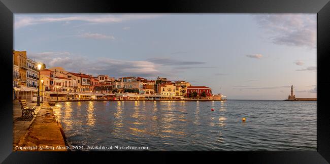 the golden hour in Chania harbour with a view of the bay and the Framed Print by Stig Alenäs
