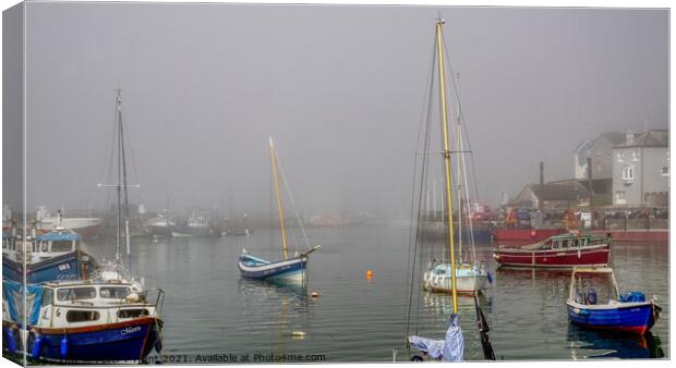 A Misty Brixham Harbour  Canvas Print by Peter F Hunt