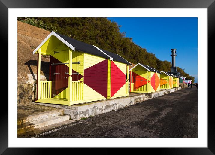 Bright beach huts on Folkestone sea front Framed Mounted Print by Clive Wells