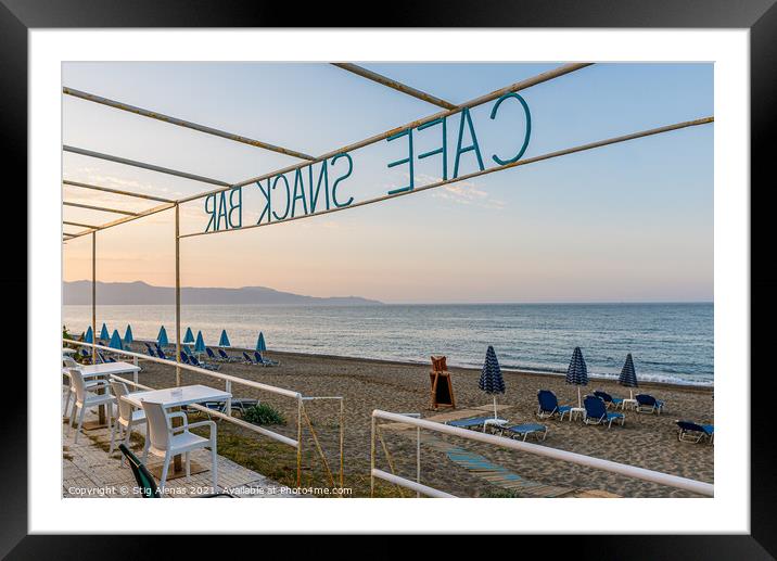 Cafe and snack bar with no guests overlooking the azure Mediterr Framed Mounted Print by Stig Alenäs