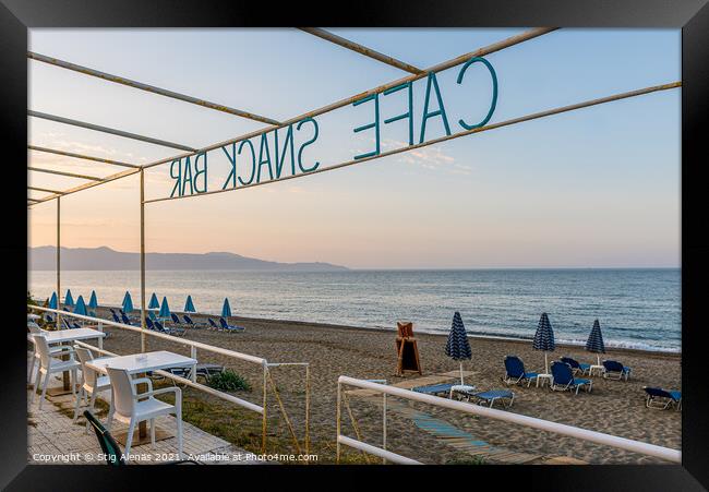 Cafe and snack bar with no guests overlooking the azure Mediterr Framed Print by Stig Alenäs