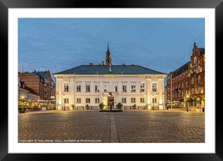 the town hall reflecting in the cobbled square at night Framed Mounted Print by Stig Alenäs