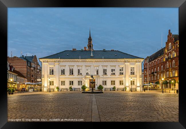 the town hall reflecting in the cobbled square at night Framed Print by Stig Alenäs