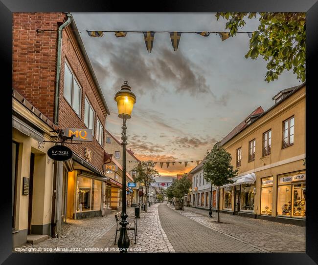 pedestrian shopping street in Ystad with a streetlight an early  Framed Print by Stig Alenäs
