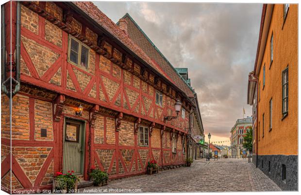 Apoteksgården an old half-timbered house in the light of street Canvas Print by Stig Alenäs