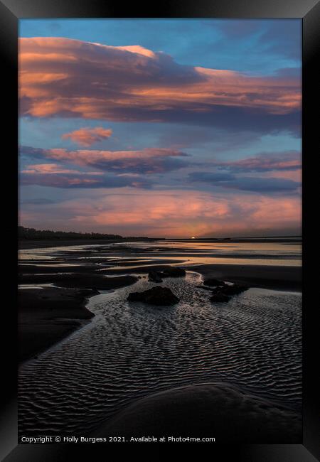 Sun's Graceful Descent Over French Mudflats Framed Print by Holly Burgess