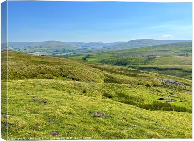 Landscape view of the Yorkshire Dales, England Canvas Print by John Brady