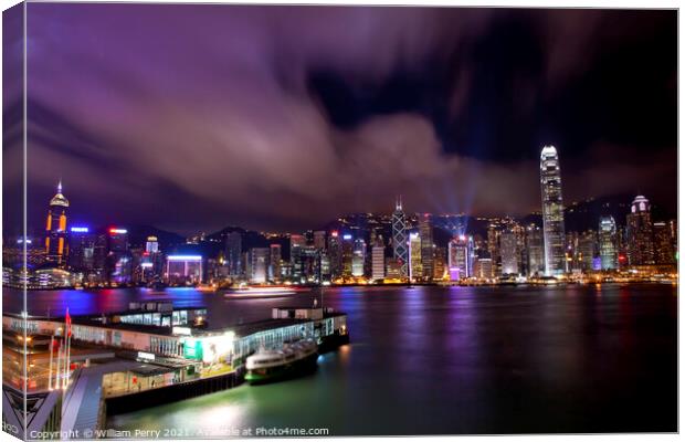 Hong Kong Harbor at Night from Kowloon Ferry Canvas Print by William Perry