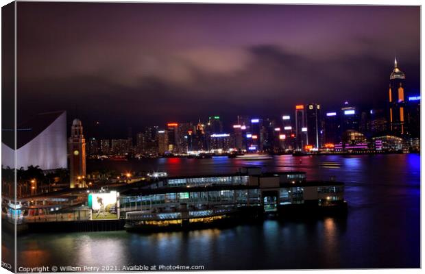 Hong Kong Harbor Clock Tower at Night from Kowloon Star Ferry Canvas Print by William Perry