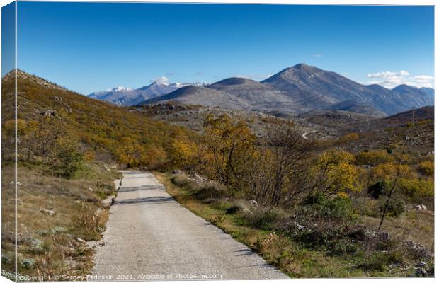 Countryside road in Croatian mountains. Balkans. Canvas Print by Sergey Fedoskin