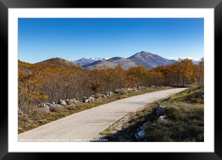 Countryside road in Croatian mountains. Balkans. Framed Mounted Print by Sergey Fedoskin
