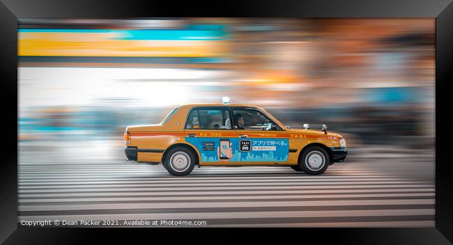 Zooming through Tokyo Framed Print by Dean Packer