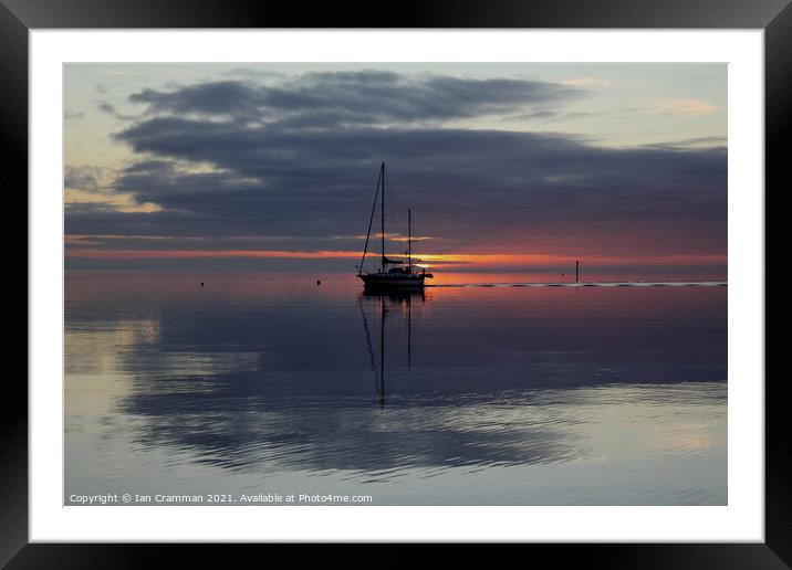 Yacht caught in the sunset Framed Mounted Print by Ian Cramman