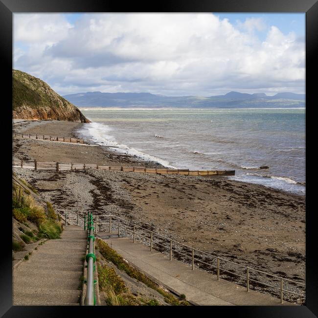 Steps down to Criccieth beach Framed Print by Jason Wells