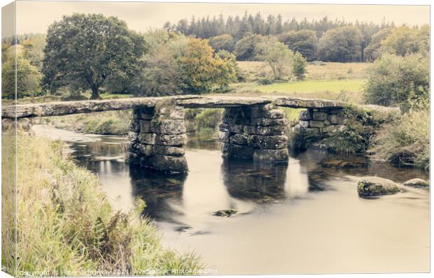 The Ancient 'Clapper Bridge' At Packbridge, Dartmoor, Devon Canvas Print by Peter Greenway