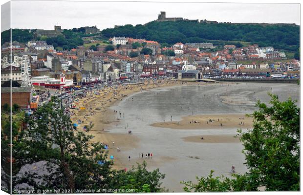 Scarborough beach at low tide, North Yorkshire, UK. Canvas Print by john hill