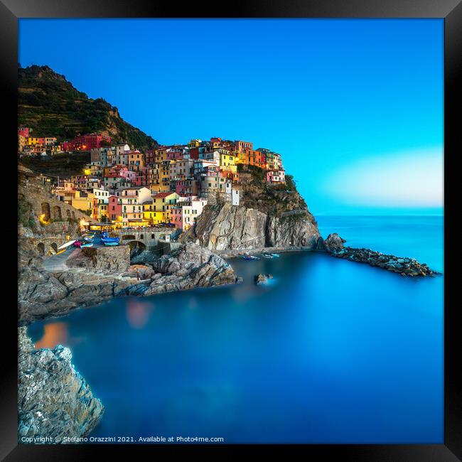 Manarola village, rocks and sea. Cinque Terre, Italy Framed Print by Stefano Orazzini