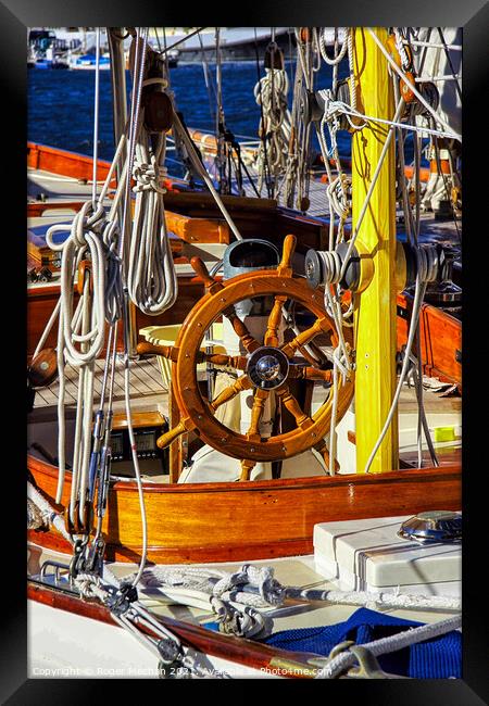 The deck of a classic sailing vessel   Framed Print by Roger Mechan