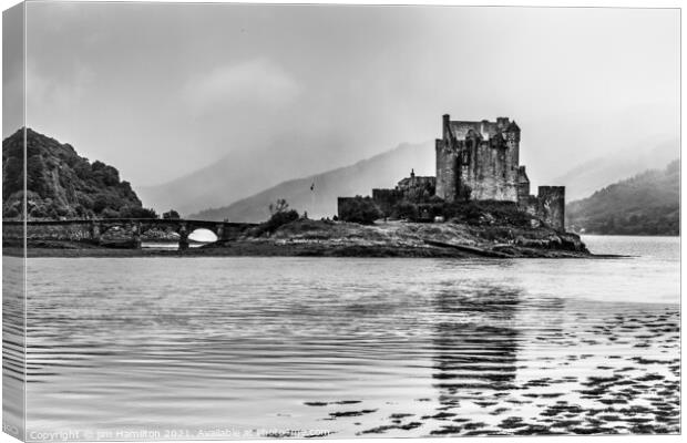 Majestic Eilean Donan Castle in Scotland Canvas Print by jim Hamilton