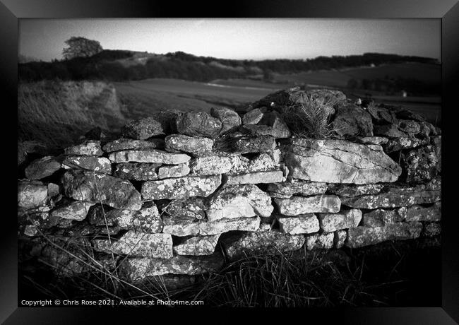 Cotswolds, late sun on a cotswold stone wall Framed Print by Chris Rose